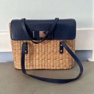 Kate Spade wicker purse with navy blue bow clasp and straps!